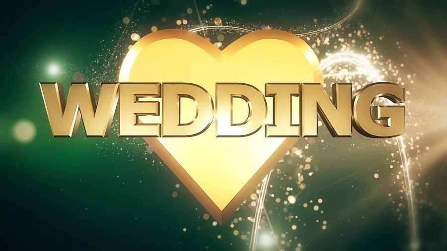 濃い緑色の背景に光の粒が舞う中金色の立体的なWEDDINGの文字とハートのロゴが浮かび上がる映画の予告編風の演出のオープニングシーン
