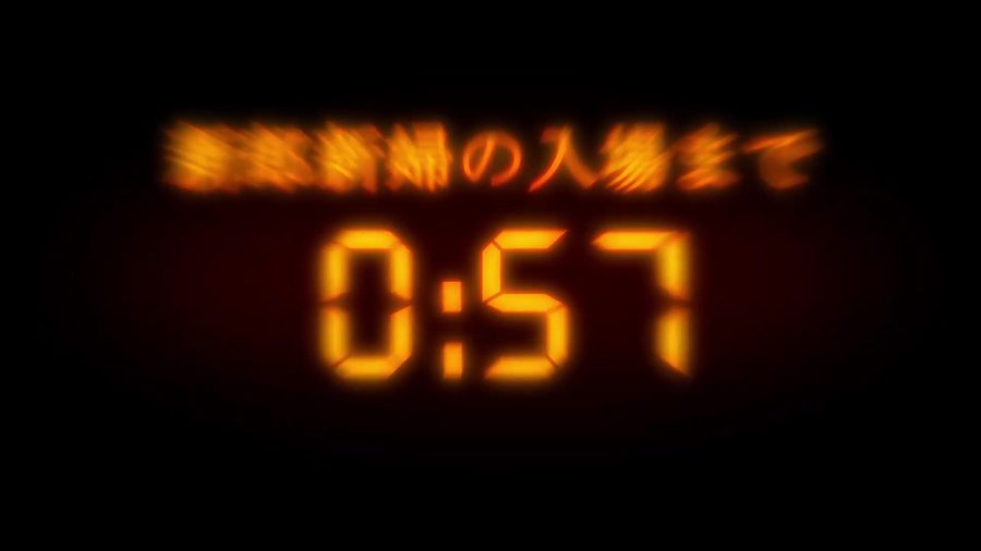 黒背景に赤橙色の発光する数字で新郎新婦の入場までの残り時間を表示するカウントダウン演出の場面