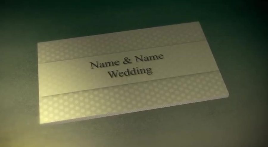 テクスチャ入りの紙にName&Name Weddingという文字を箔押し風にデザインしたタイトルカードを斜めから映すオープニングシーン